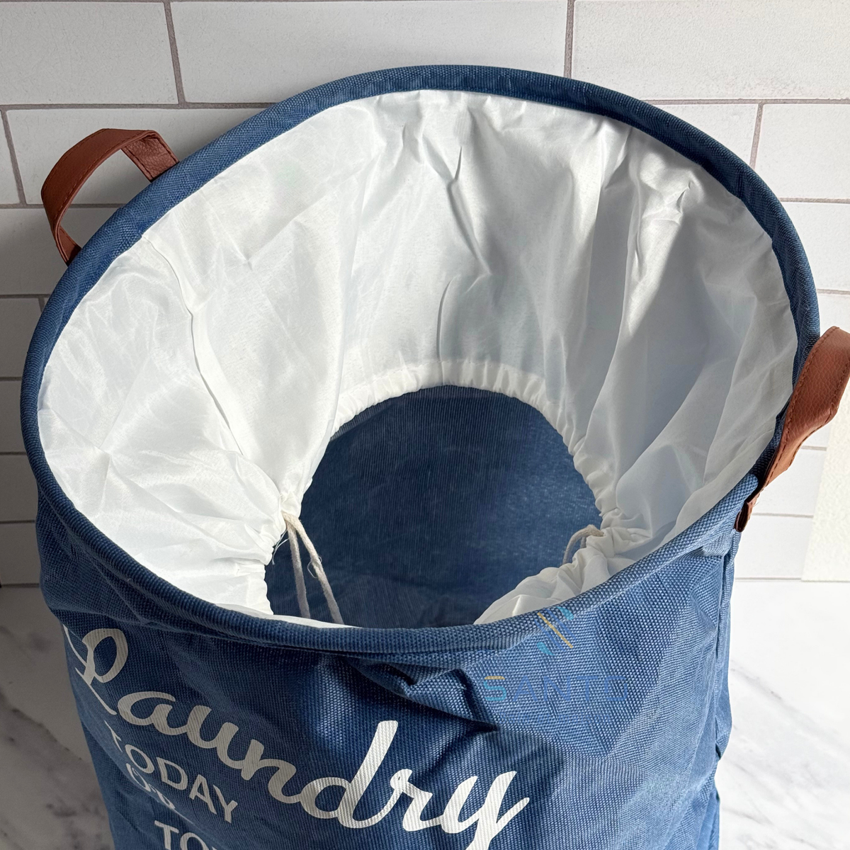 Panier à linge rond en tissu avec anses camel